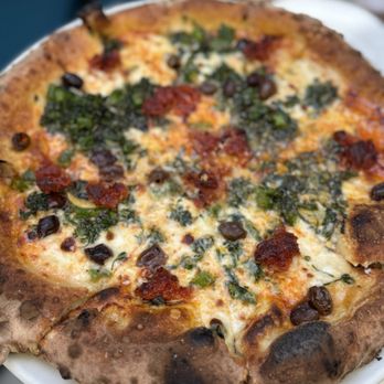 Cecconi’s West Hollywood signature dishes Spaghetti with Lobster, Agnolotti del Plin with Black Truffle, various pizzas, brunch items like Ricotta Hotcakes.